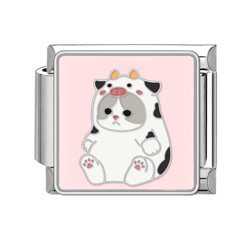 Dog in a cow costume pendant