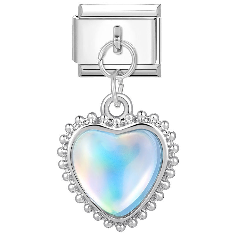 Silver heart pendant with blue stone