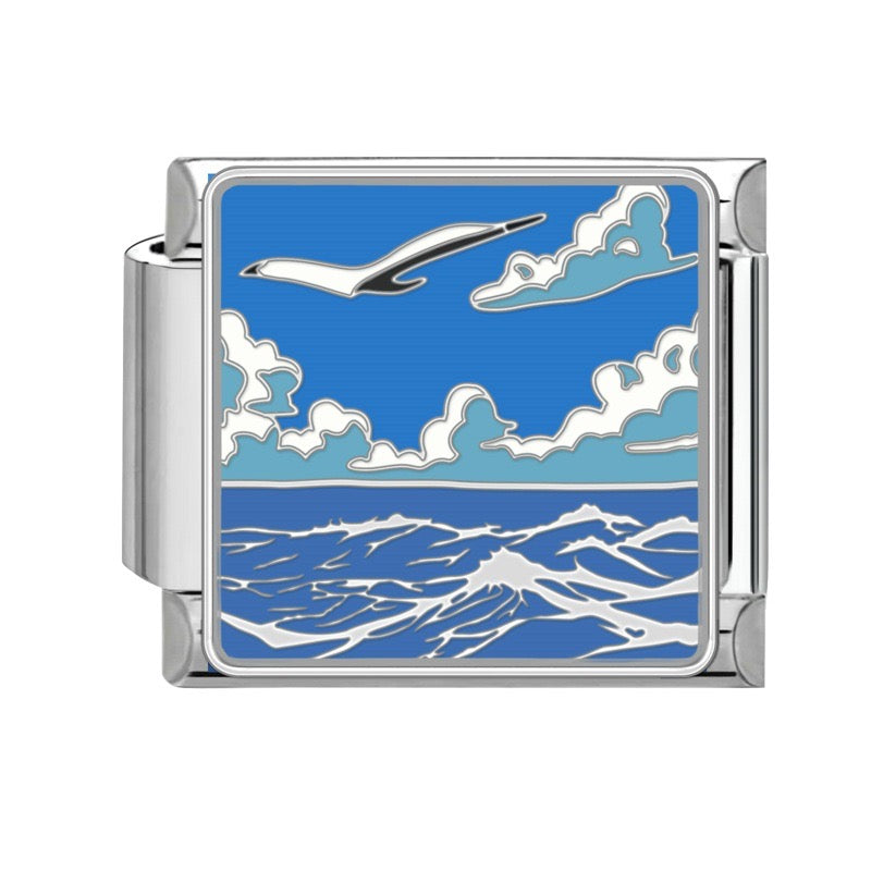 Pendant Seabird above the waves