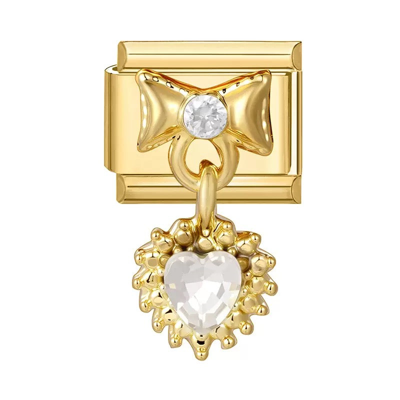 Ragyogó szív masnival medál