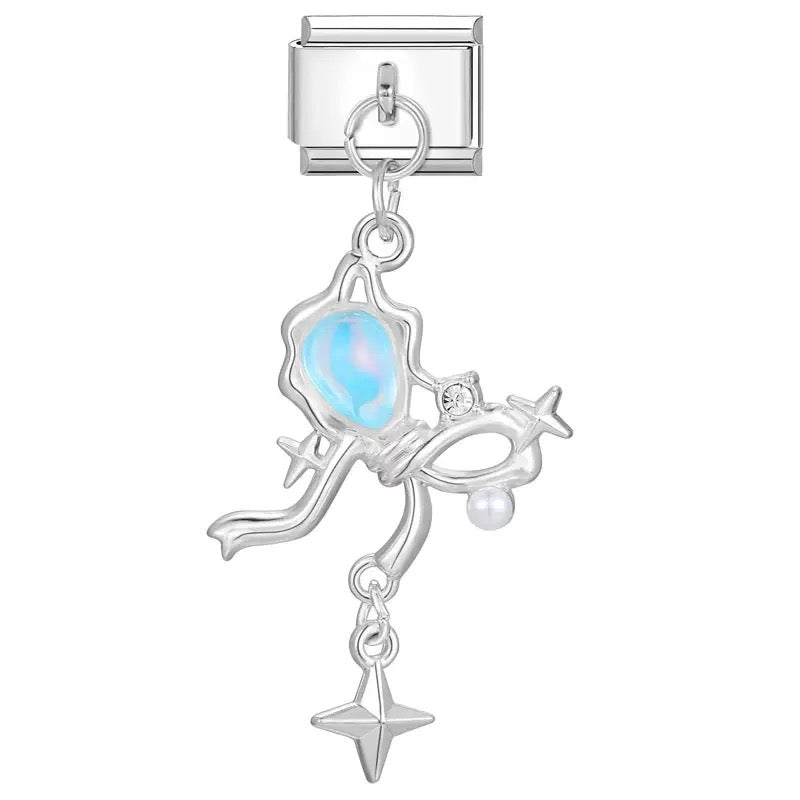 Ezüst kék masni csillagokkal medál