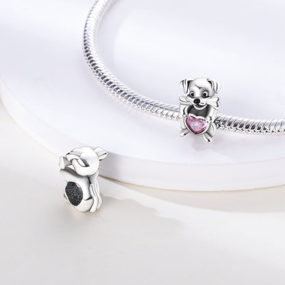 Pies z koralikiem w kształcie kości