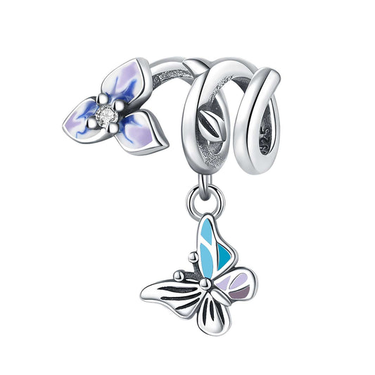 Motyl na wisiorku z kwiatem