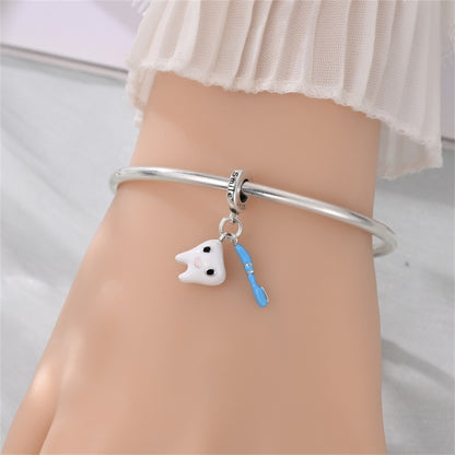 Prívesok Úsmevný zúbok