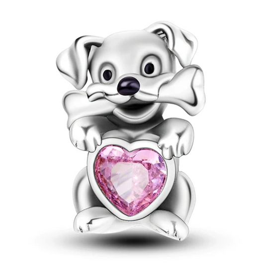 Pies z koralikiem w kształcie kości